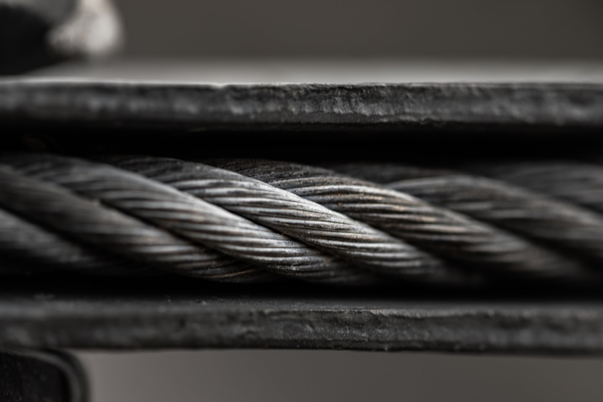 Close-up view of iron cable rope (Cable sling drum reels). Steel wire cable or rope for heavy industrial construction technology, Pattern Of Wire rope texture, Copy space, Selective Focus.