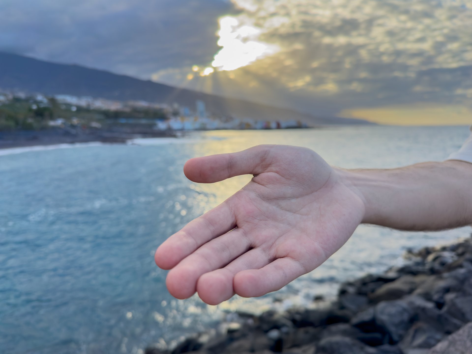 Jesus Christ giving his arm, hand gestures of Jesus dying on the cross and resurrected,