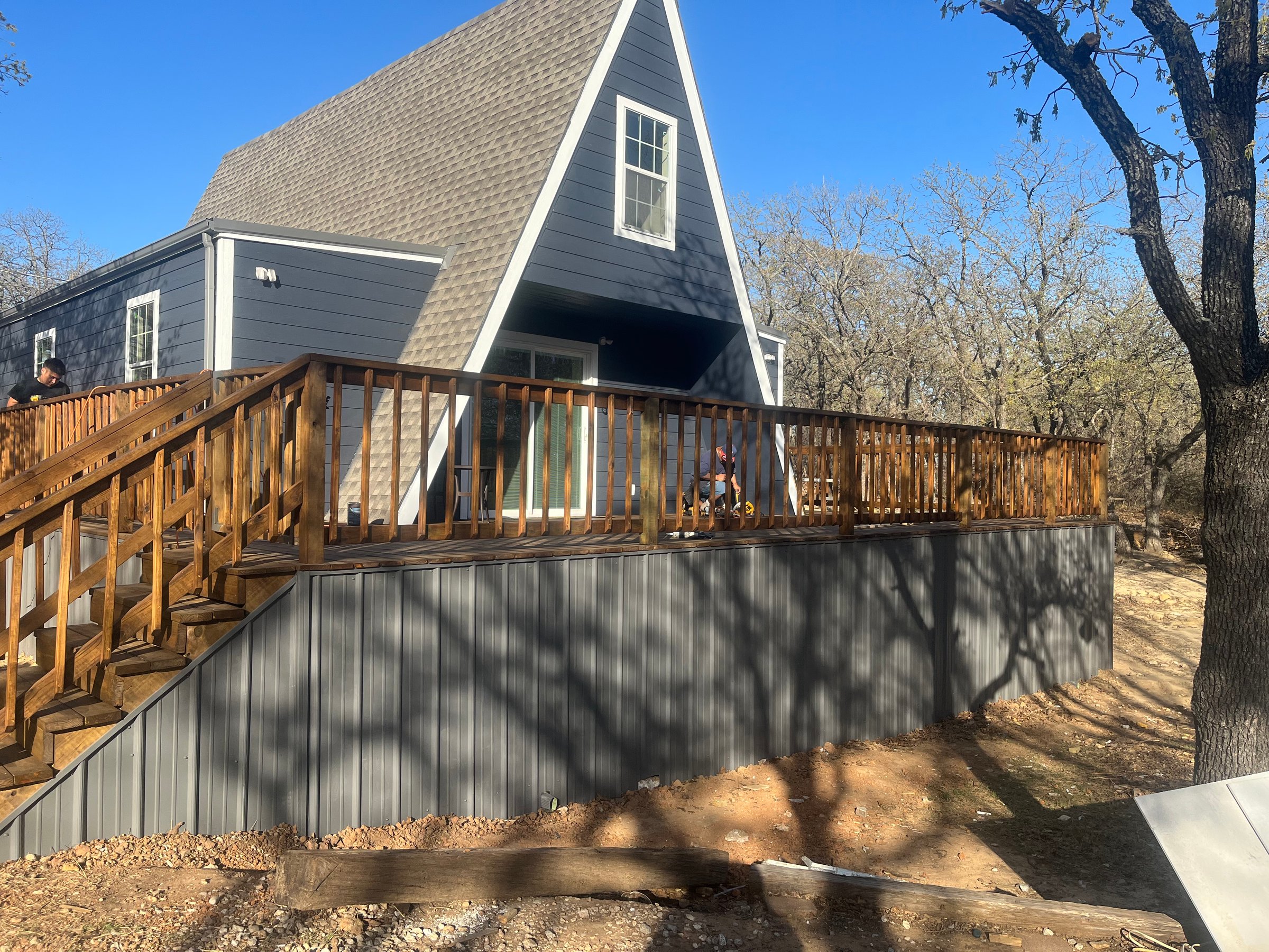 Residential Construction Interior with Exposed Wood Framing and Windows