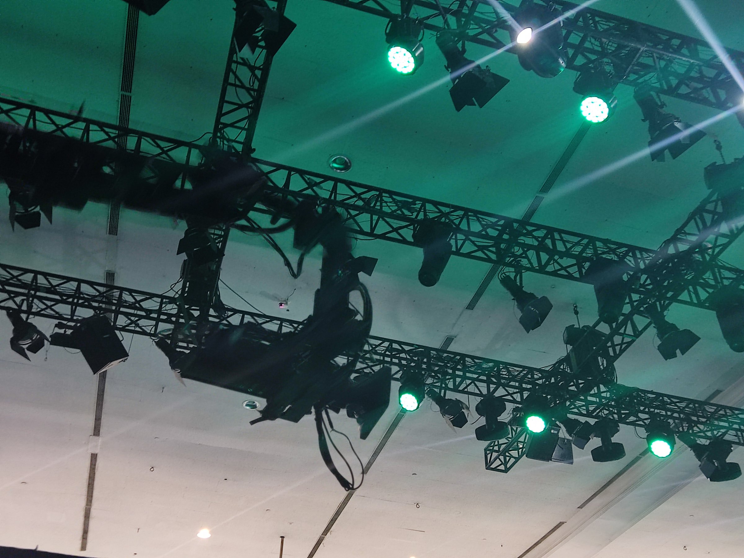 Lighting and camera setup on exhibition ceiling fashion show