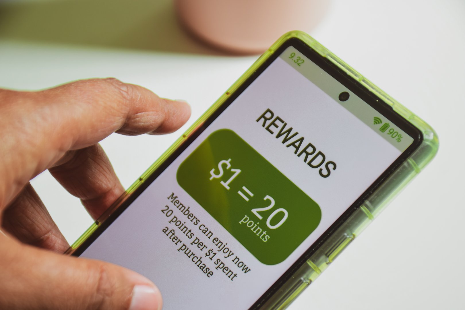 Example of customer loyalty programs in e-commerce. Reward points earned after purchase. Digital display, selective focus.