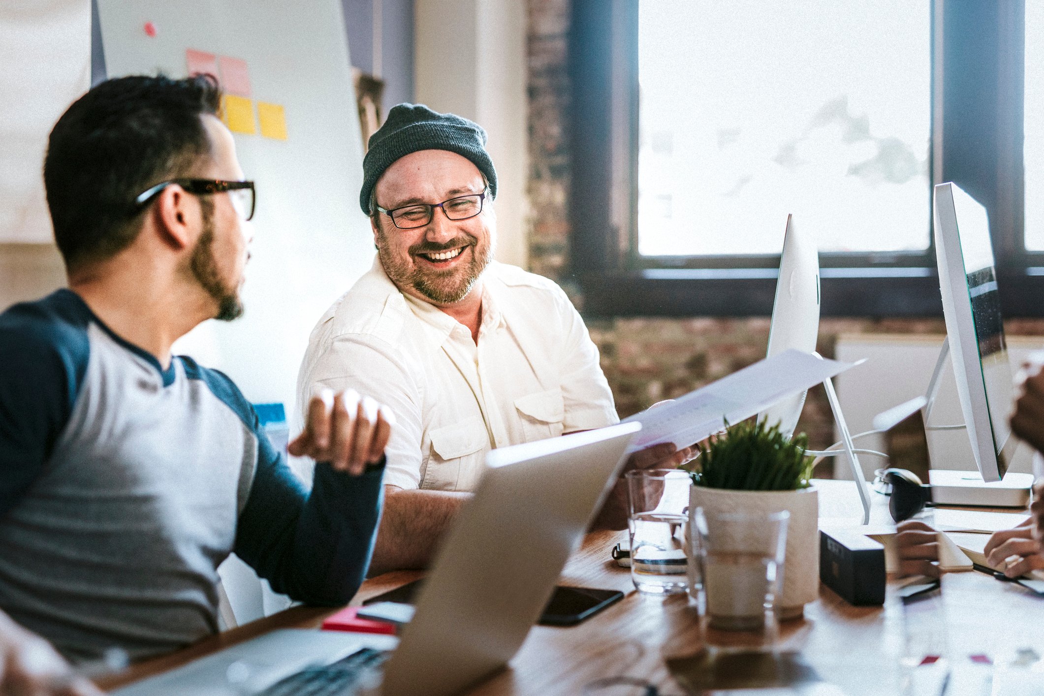 Business professionals collaborating on digital marketing strategy