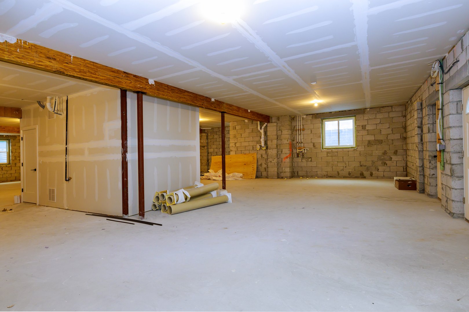 Unfinished new build interior construction basement renovation ground floor Inside