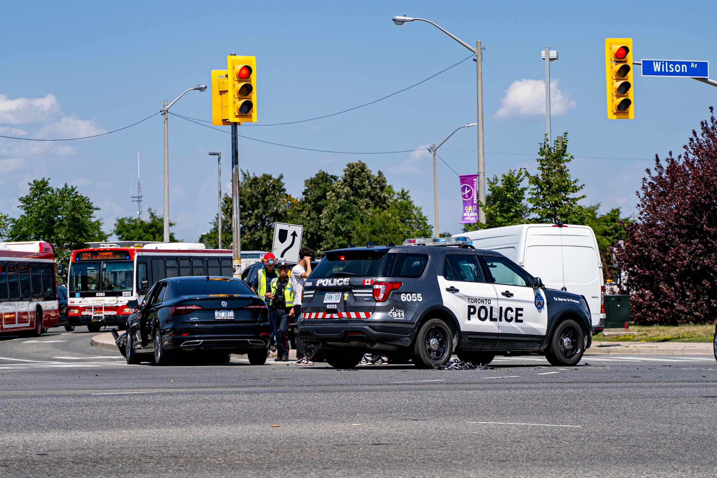 Toronto traffic accident scene with police car.