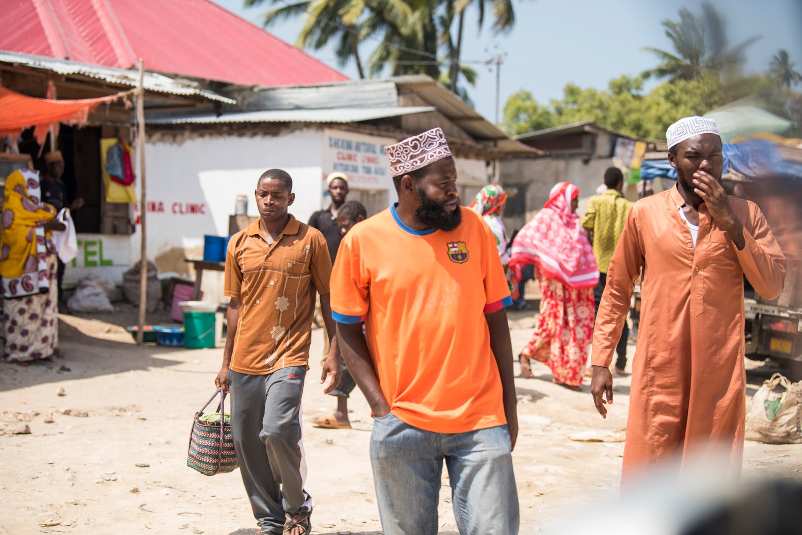 Zanzibar,Tanzania,01/05/2019. Street view of the usual daily life of local people of all ages taking place along the road on the Zanzibar Islands in Tanzanian archipelago off the coast of East Africa