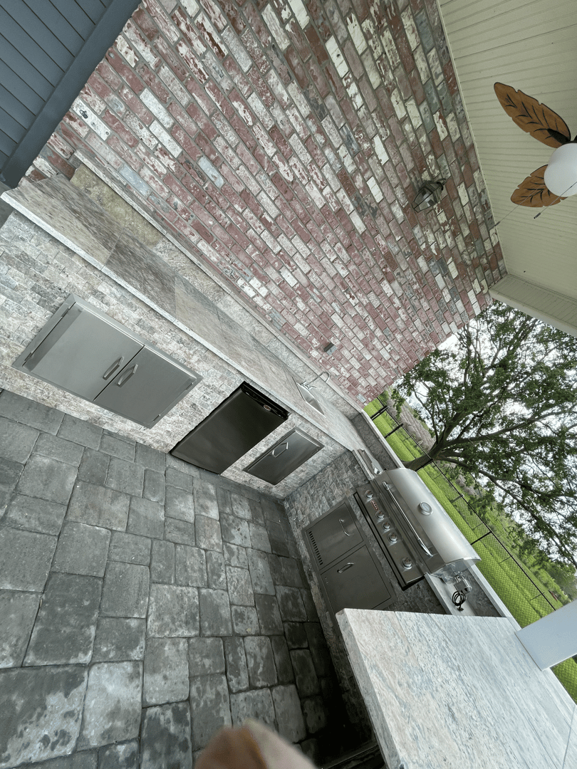 Outdoor kitchen installation Houma Louisiana - custom backyard cooking area with grill and countertops