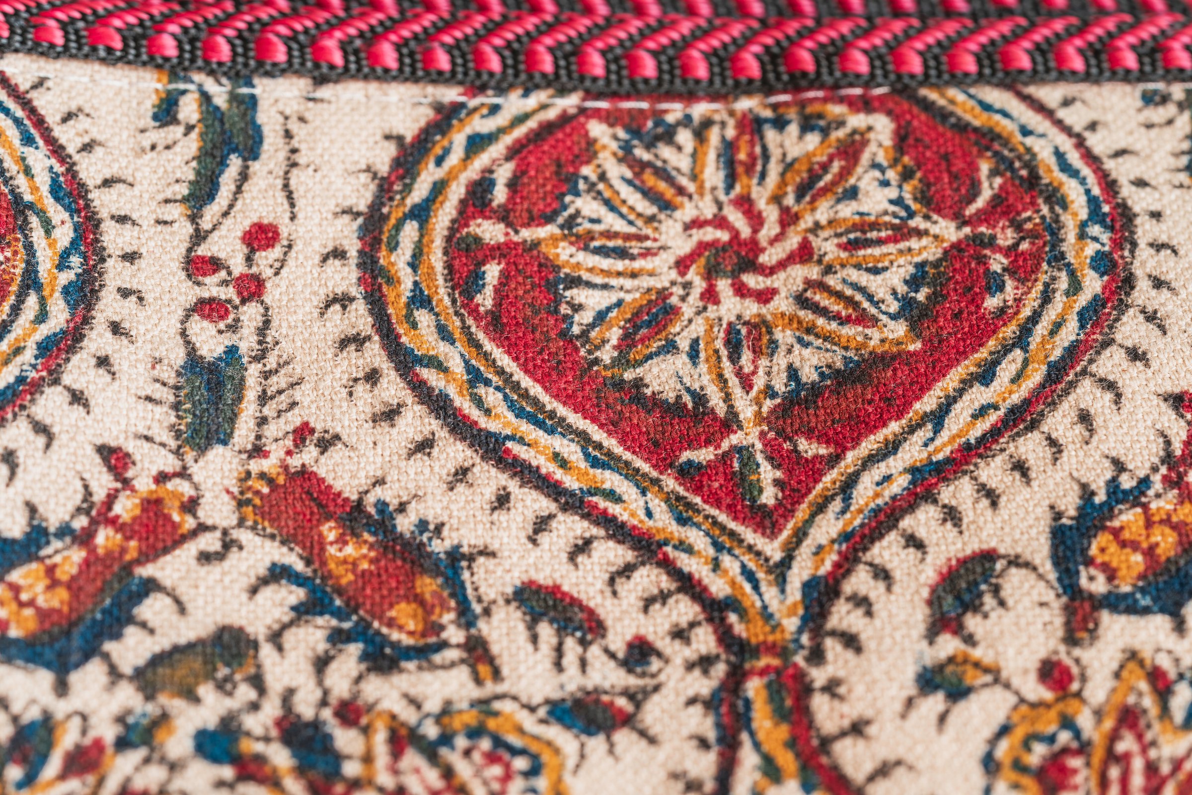 Close-up of a traditional textile with an intricate floral motif