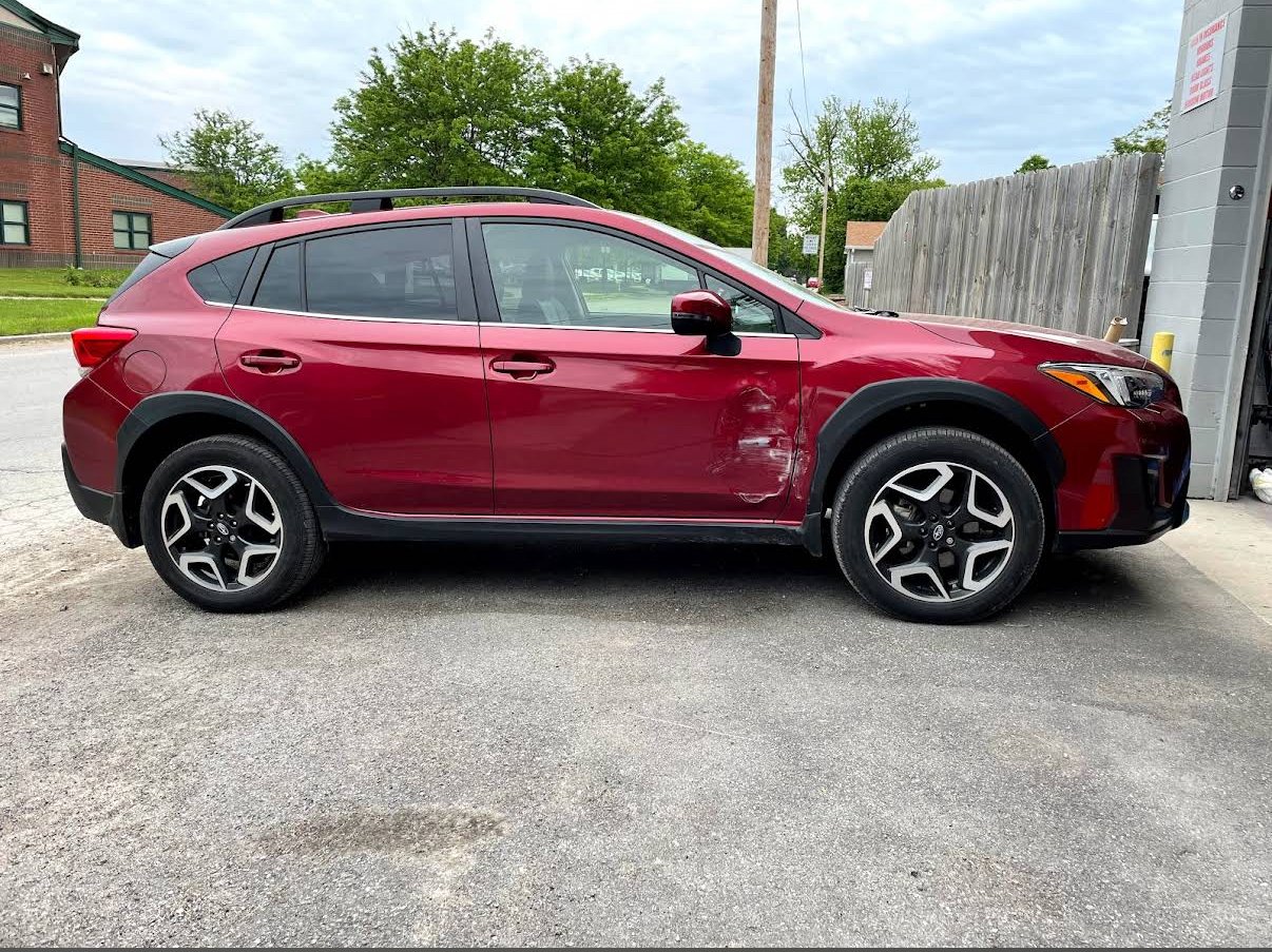 Vehicle repair work at Campbell's Collision Repair