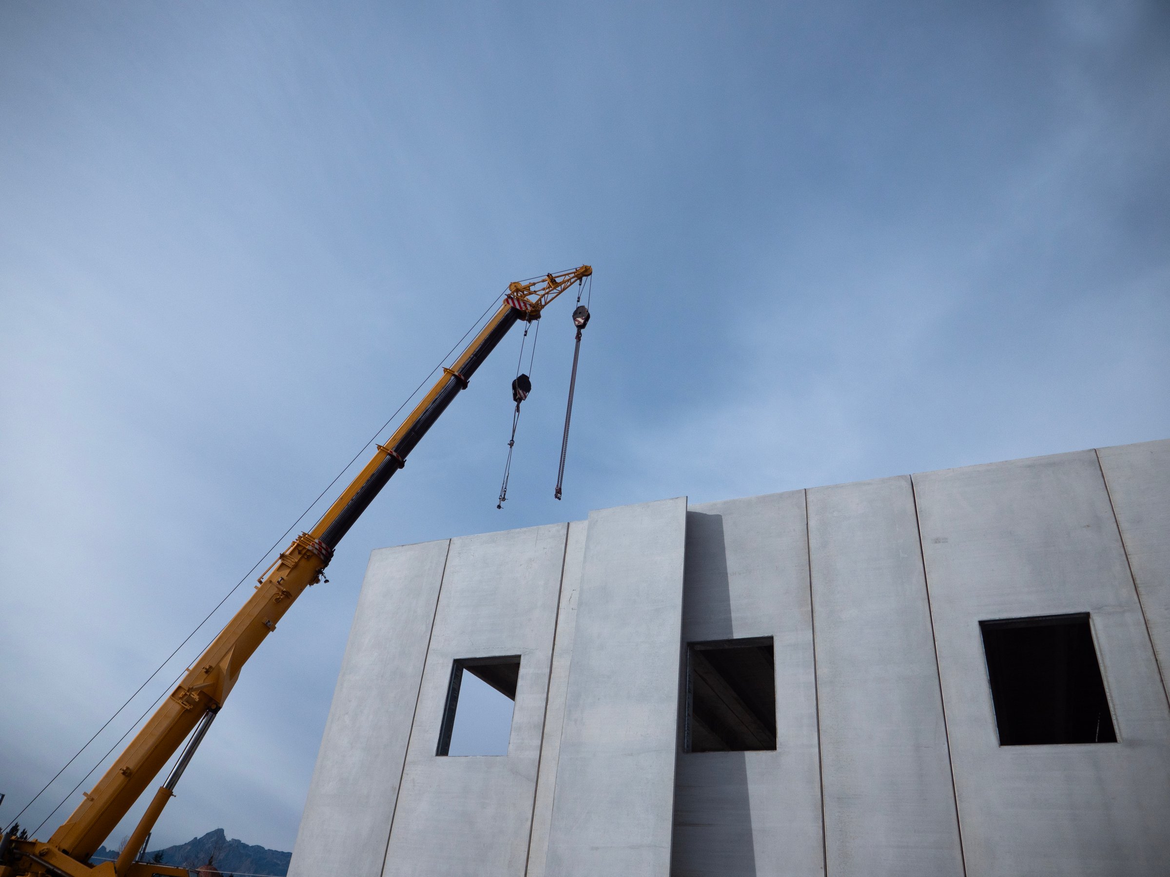 concrete prefabricated modular walls in construction site
