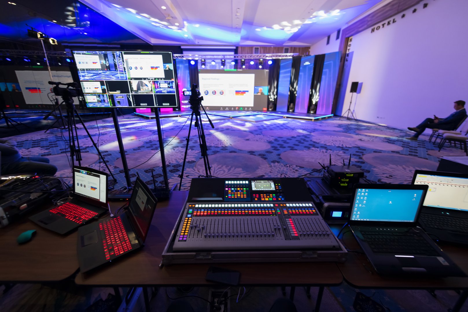 Live internet streaming of business conference meeting, presenter joining a seminar via video conference call in empty convention center. Online webinar or seminar via social network broadcast in new normal, covid outbreak,e-learning.