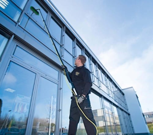 Professional window cleaning with water fed pole system