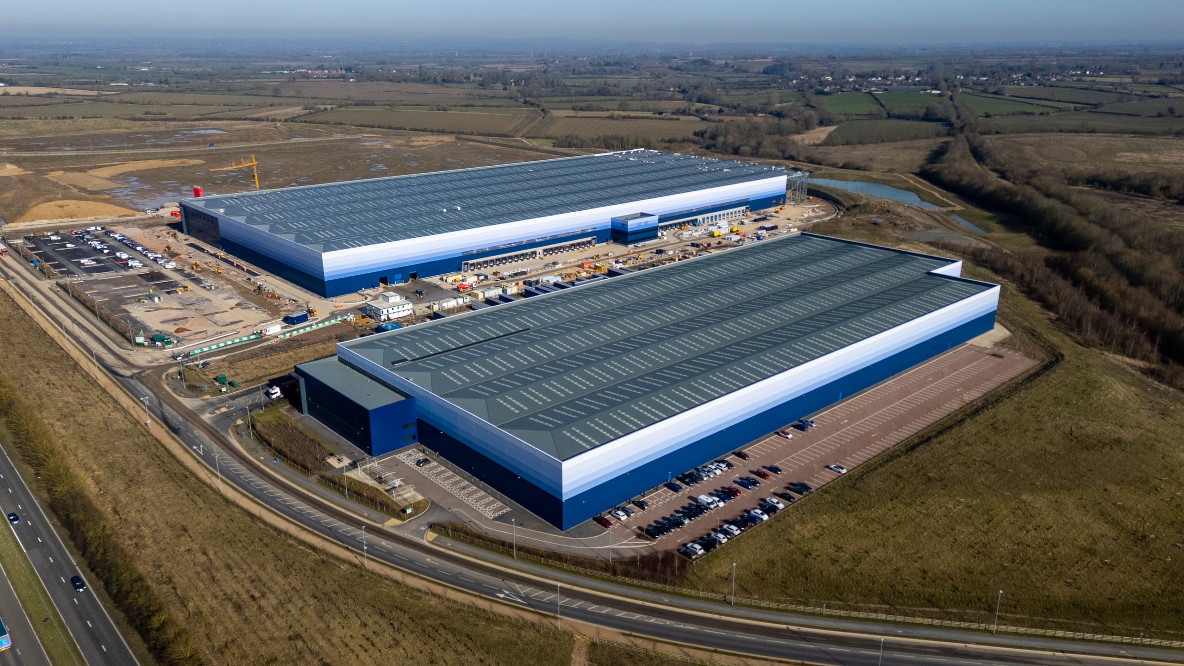 Aerial view of a large distribution center with loading docks