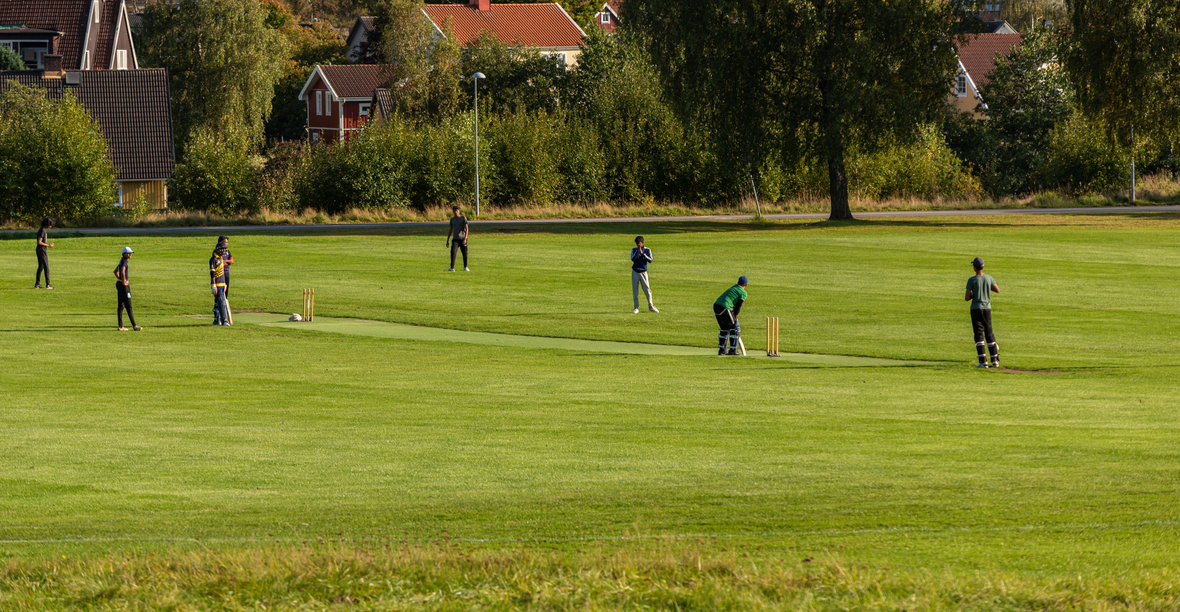 Gothenburg, Sweden - september 26 2021: Playing a game of cricket at Kviberg.