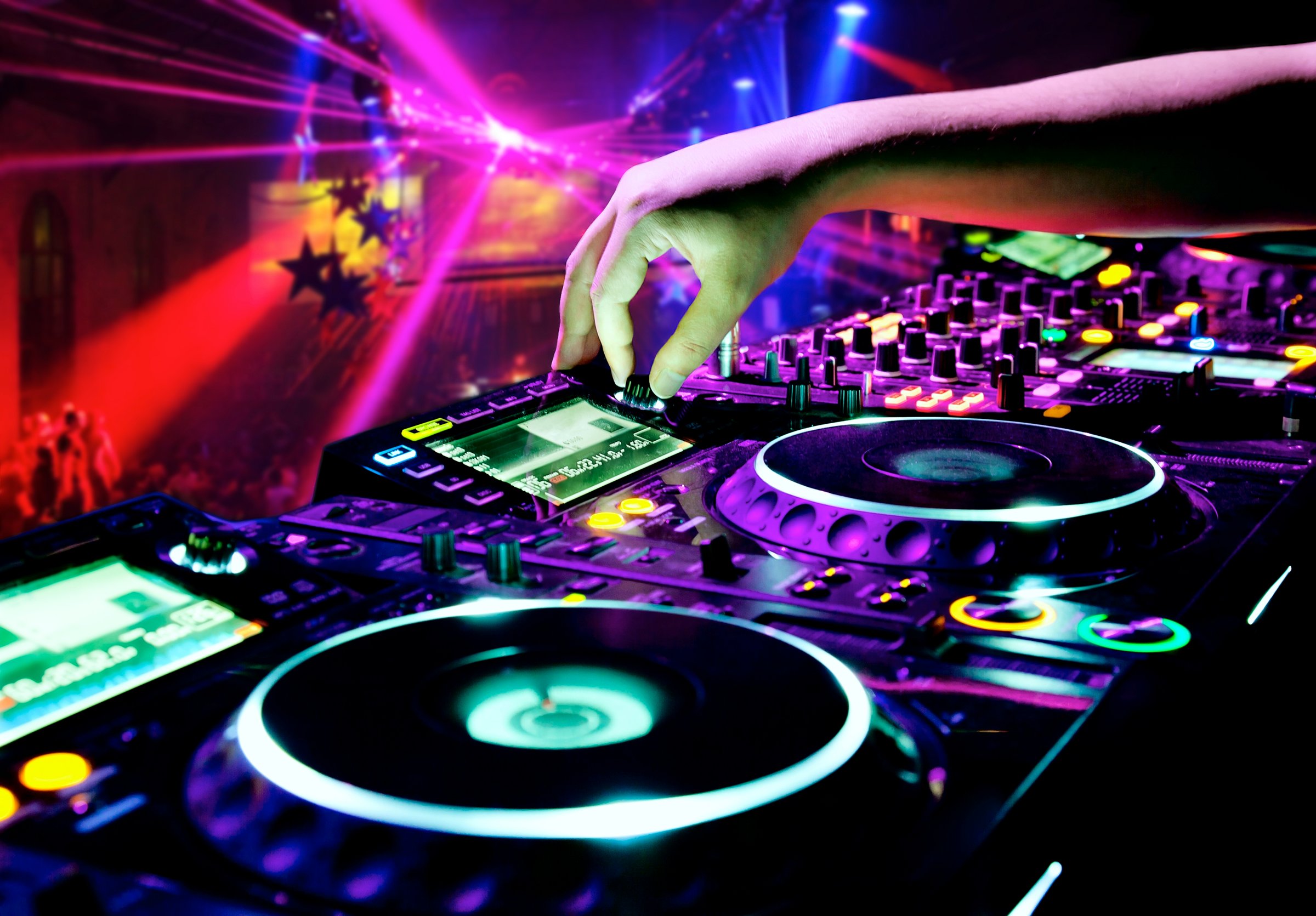 Dj playing the track in nightclub at party