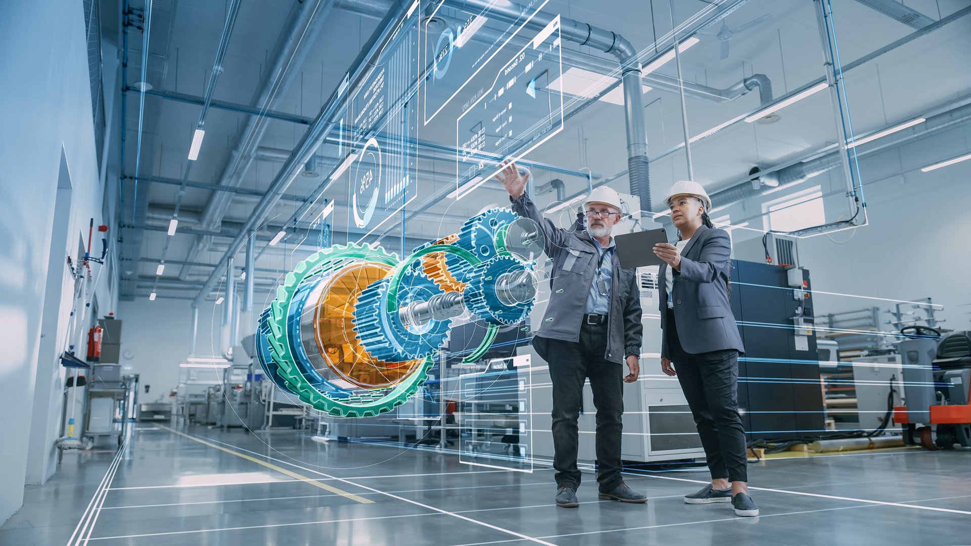 Factory Digitalization: Two Industrial Engineers Use Tablet Computer, Visualize 3D Model of Clean Green Energy Engine