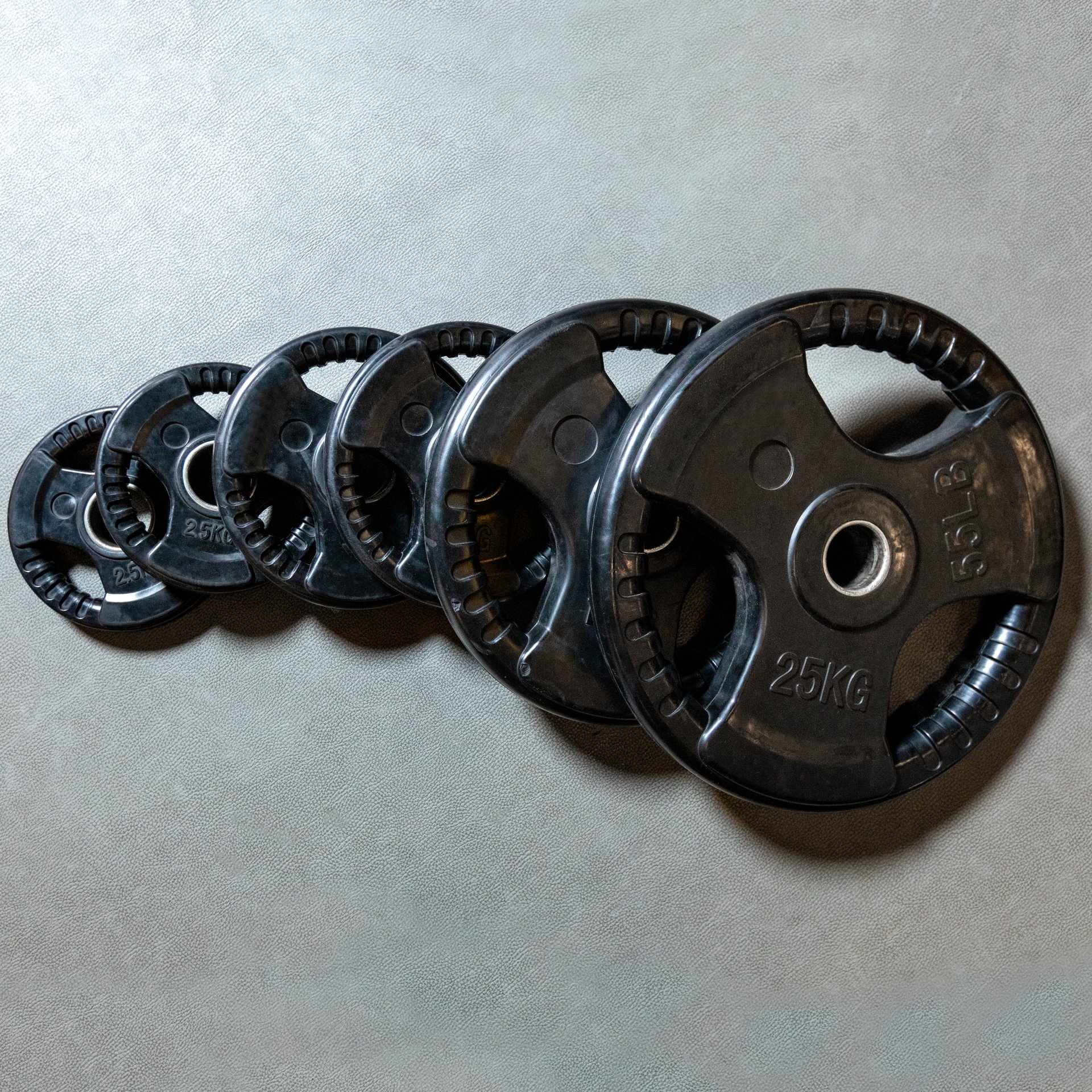 Different barbell weights isolated