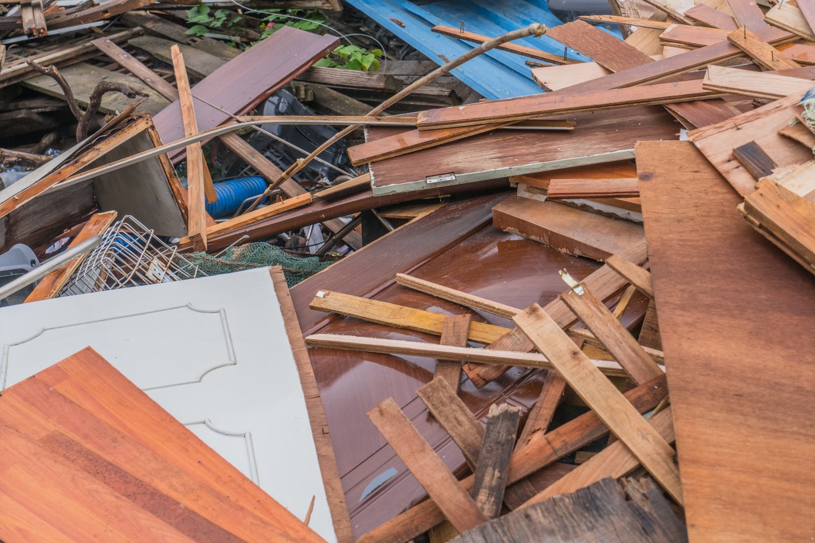 Pile of scrap metal and wood for collection.