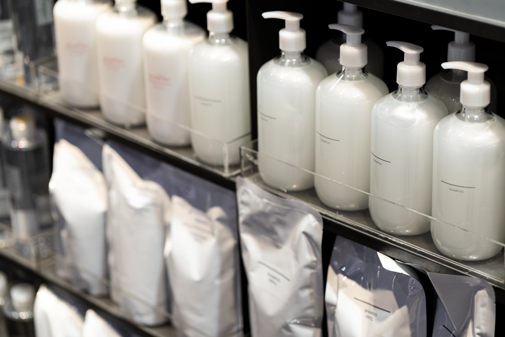 Refill to reduce plastic waste. soap or shampoo for refill. plastic bottles for refill liquid soap, shampoo and other products. Reusable Bottles for Soap and Shampoo in Zero Waste Lifestyle.