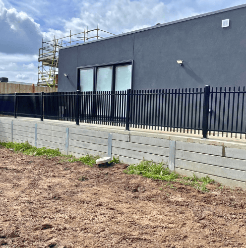 Textured block retaining wall