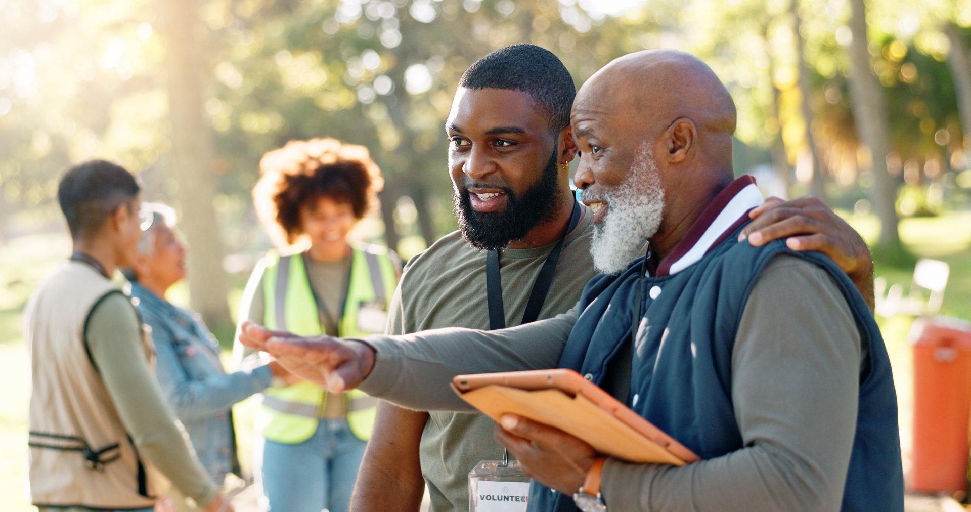 Cleanup, people and volunteers planning with tablet for support, community project or nature sustainability. Humanitarian, recycling or senior leader in charity service or NGO for park pollution