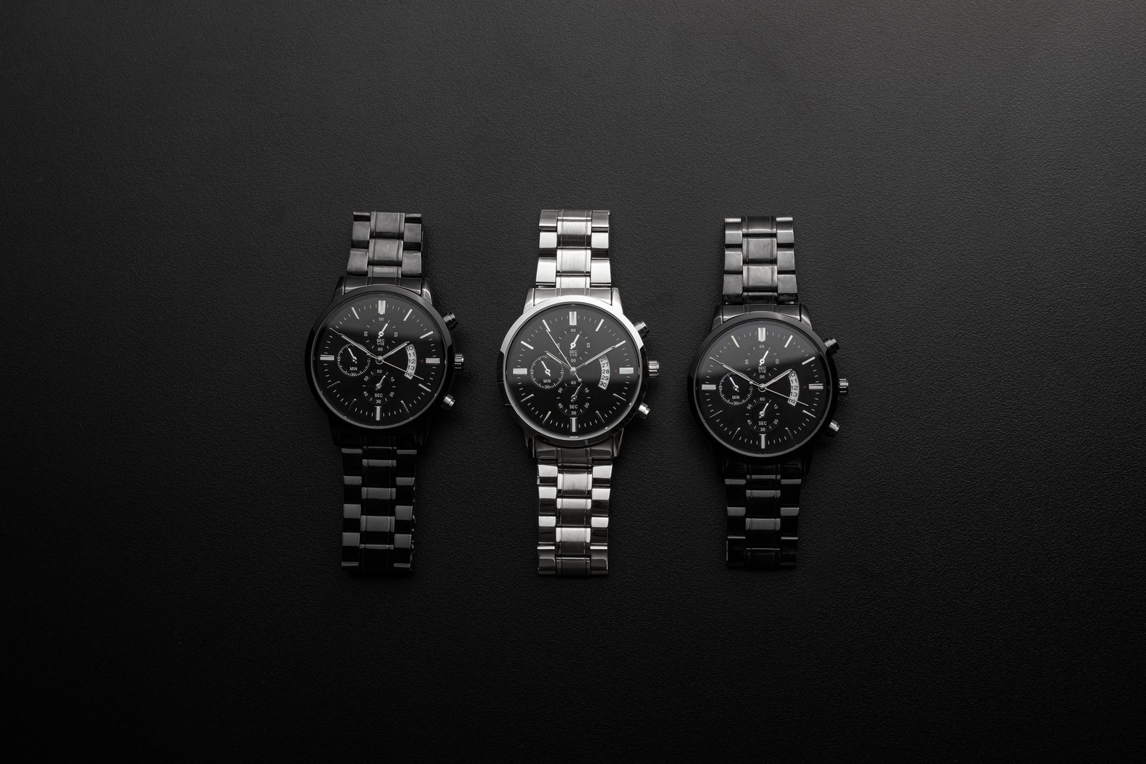 Luxury white chrome watch on black background