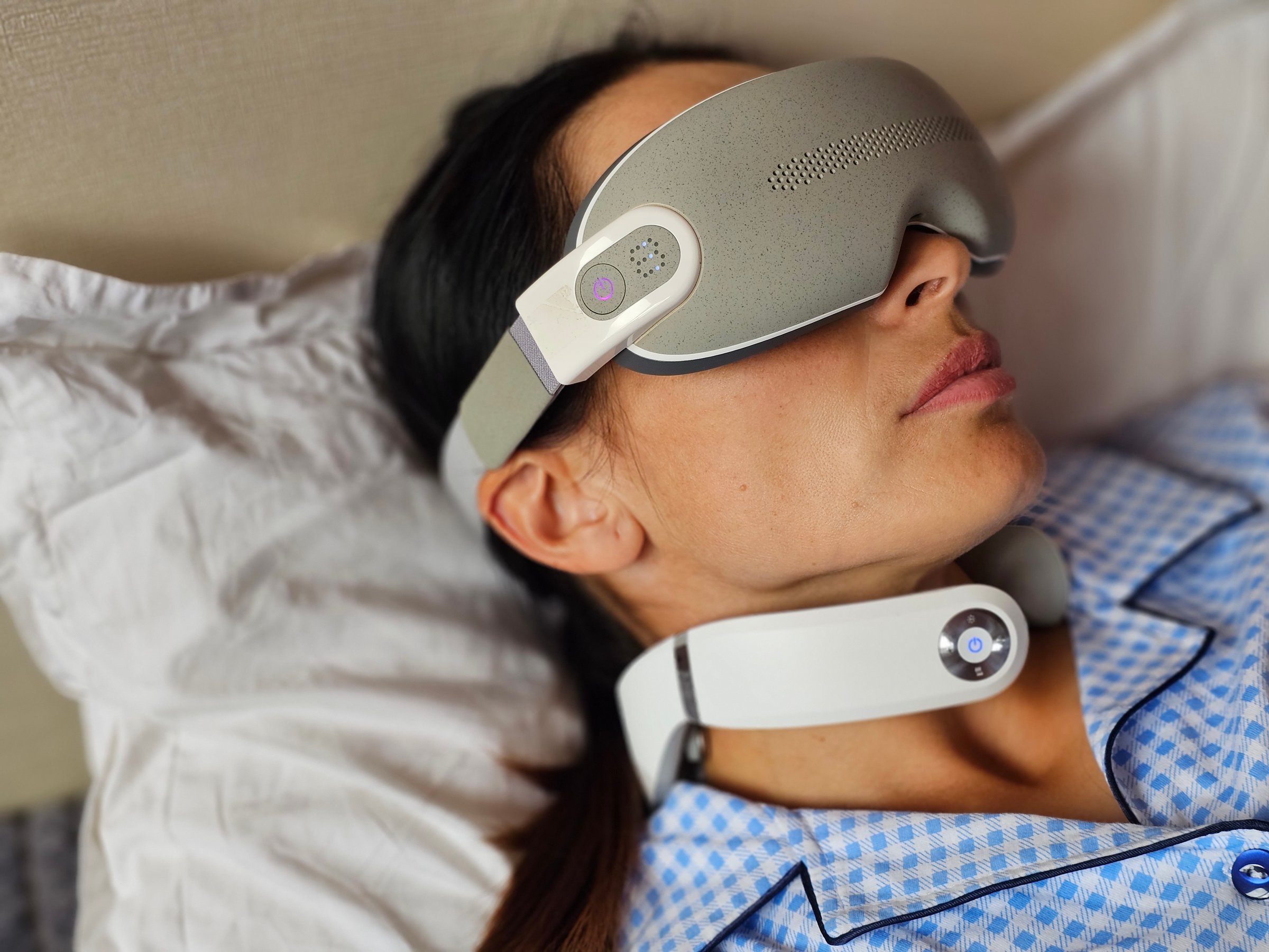 A woman experiences relaxation while wearing advanced sleep technology.