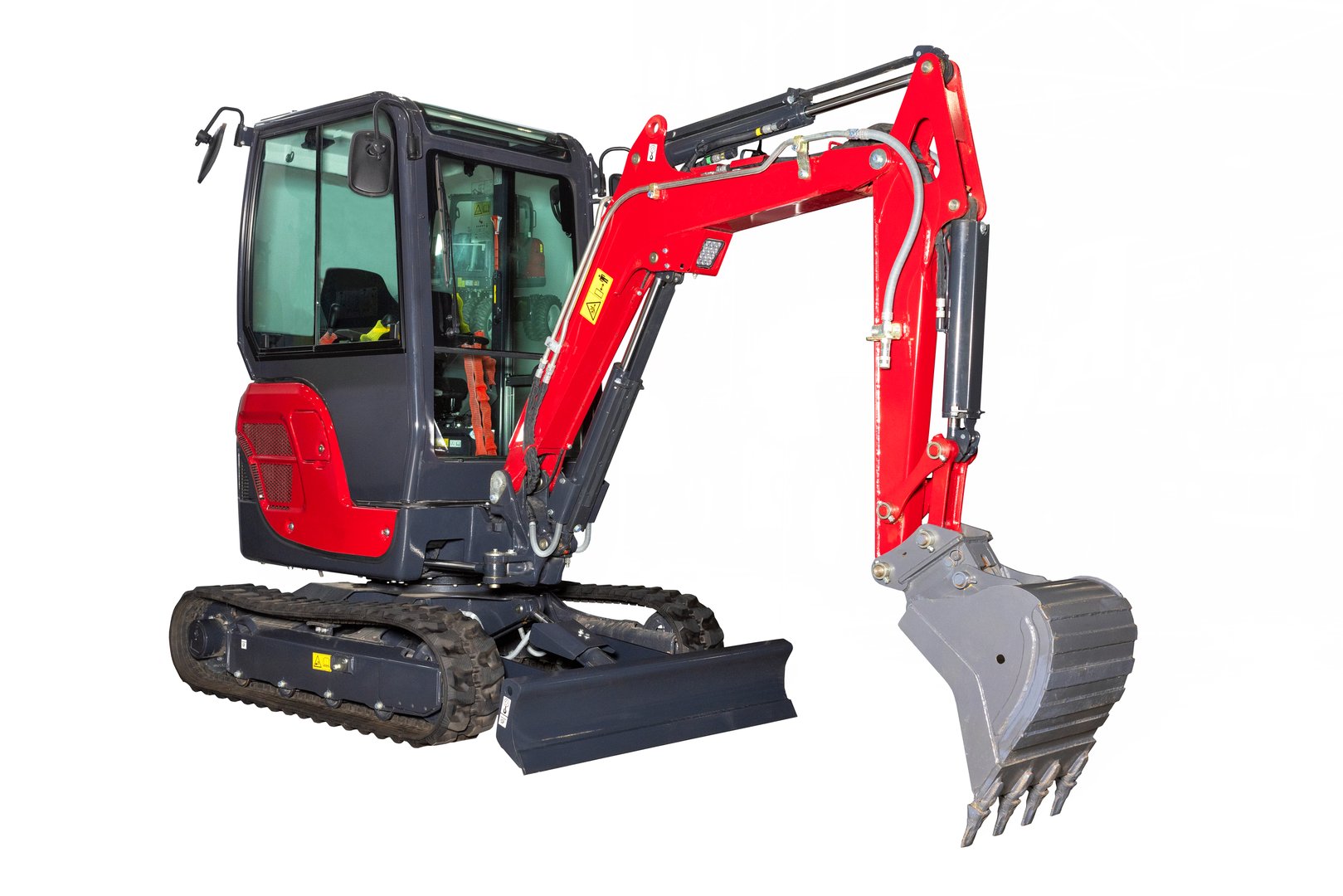 Modern compact excavator with extended arm and open bucket, ready for digging and earthmoving tasks. Isolated on white background.