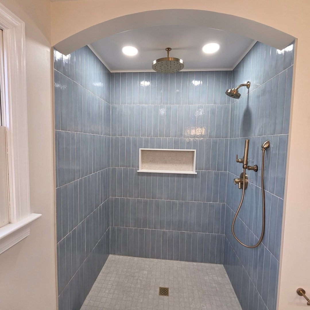 Blue vertical subway tile shower Toledo Ohio