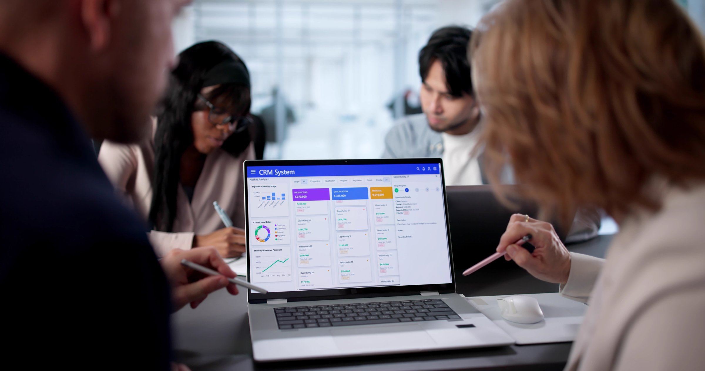 African American Man And Woman Using CRM Software In Office.