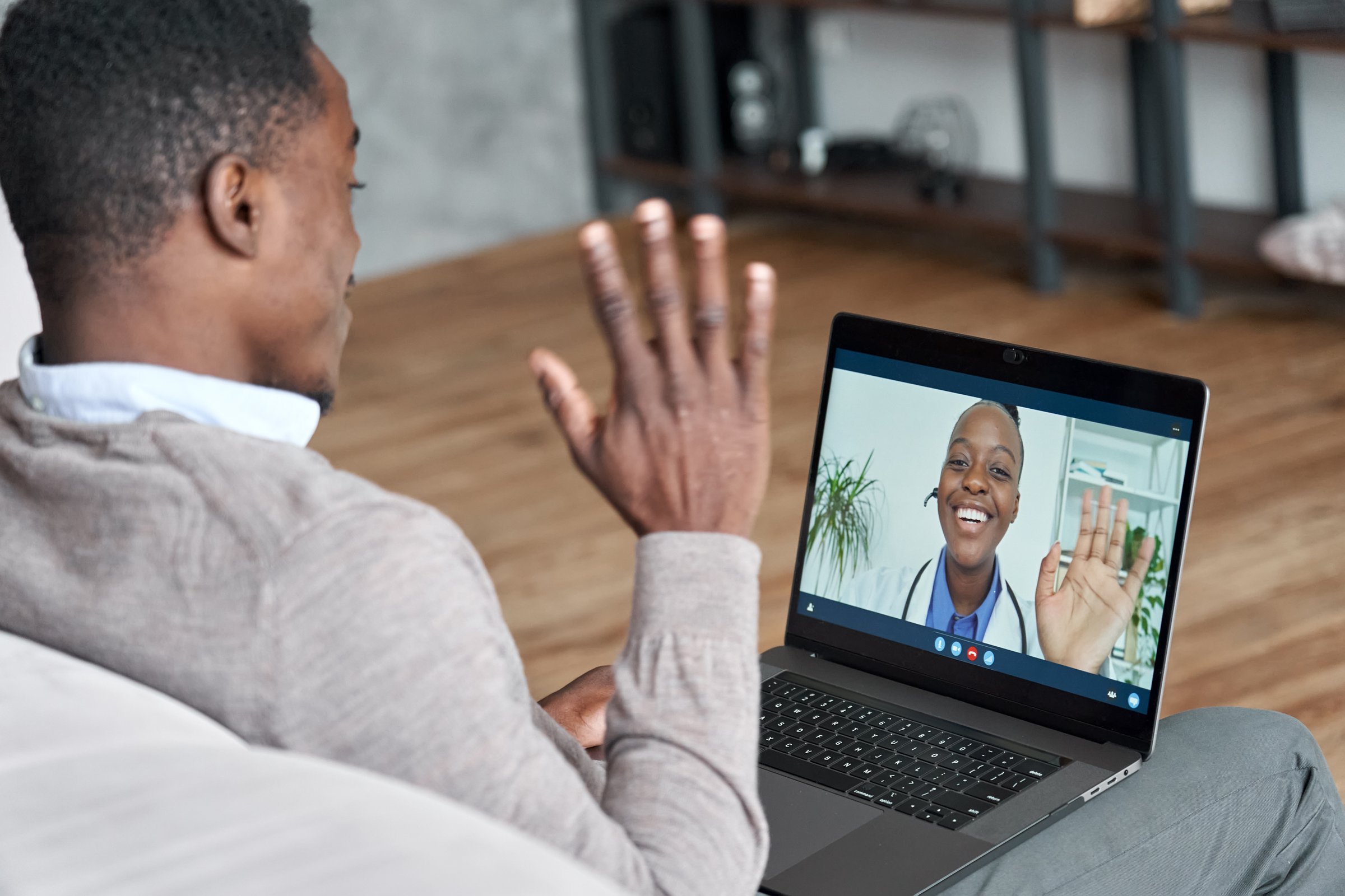 Telemedicine consultation with Black doctor and patient