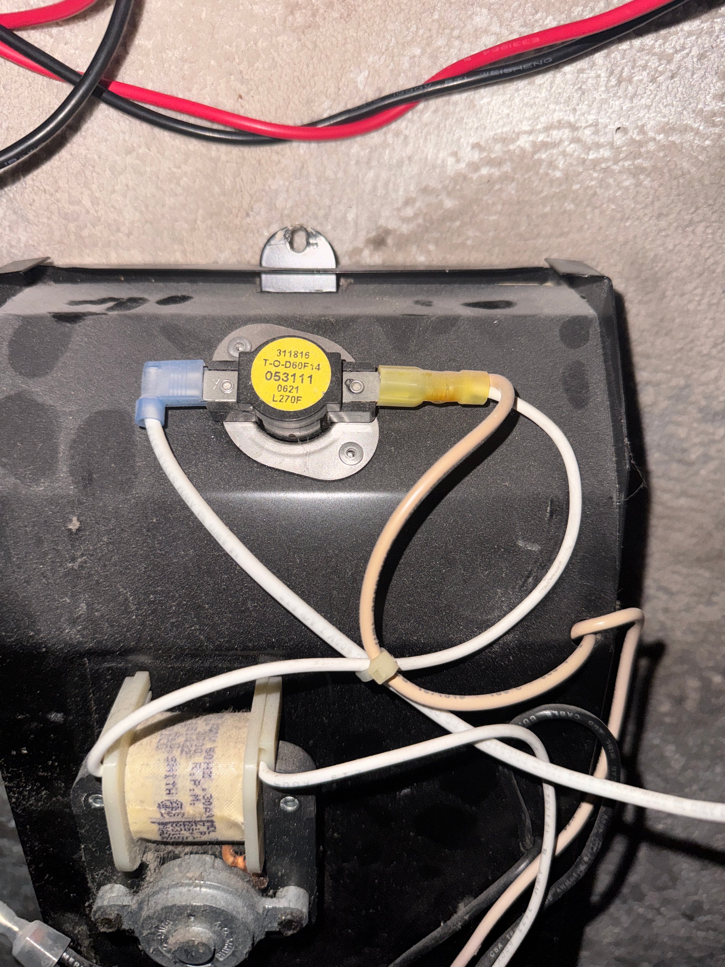 Electrician working on panel