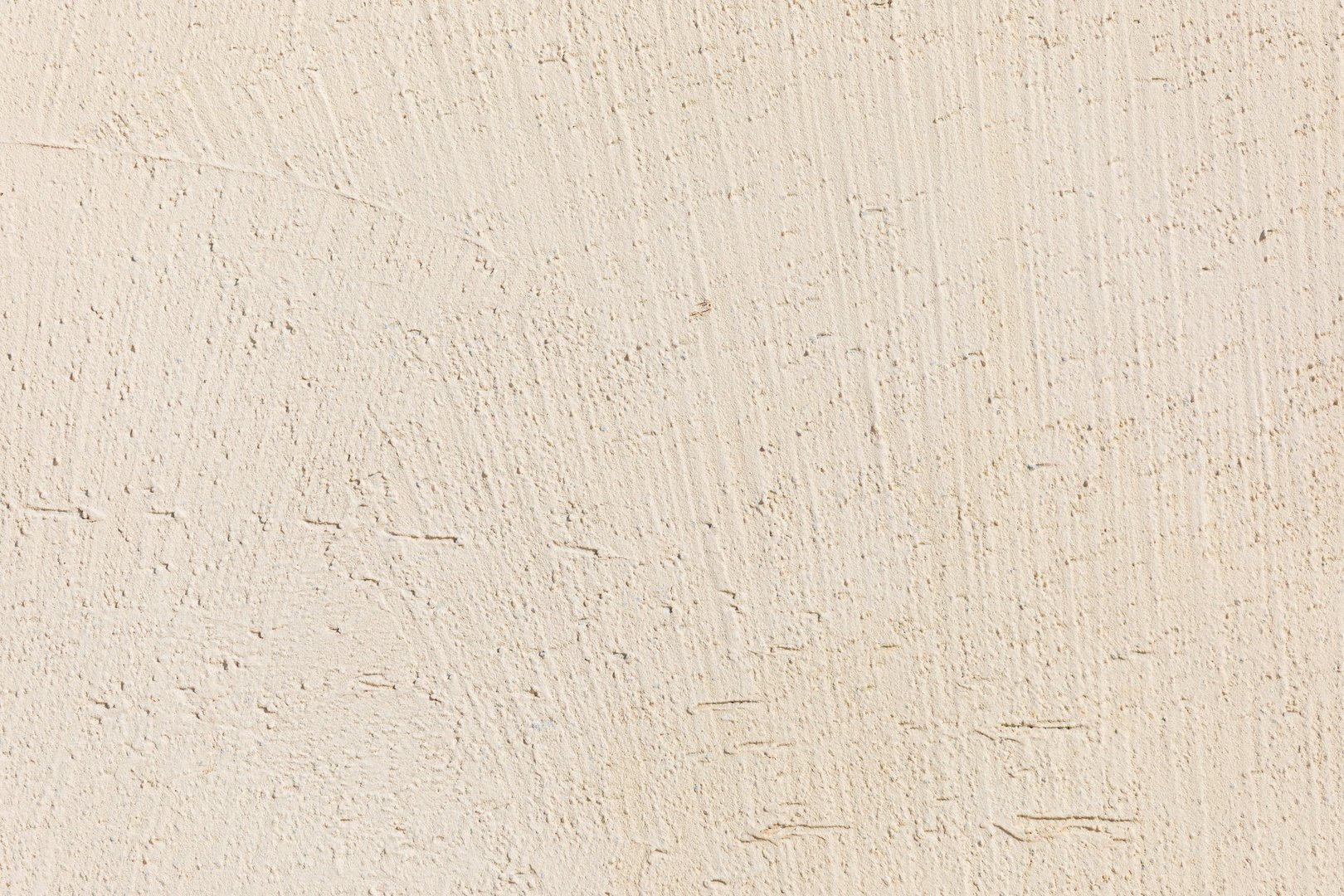 Rough Beige Plaster Wall Texture Close-Up