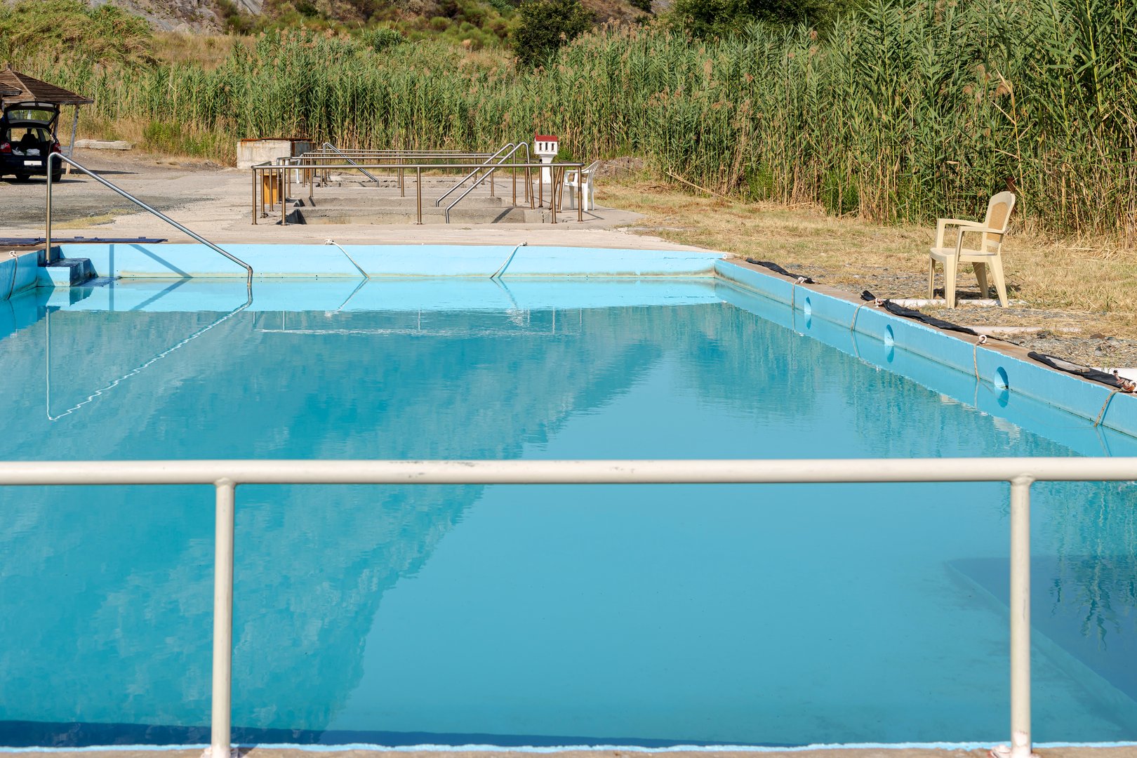 Enclosed pool with a thermal spring with hot, healthy mineral water near the town of Kamena Vourla (Phthiotis, Greece)