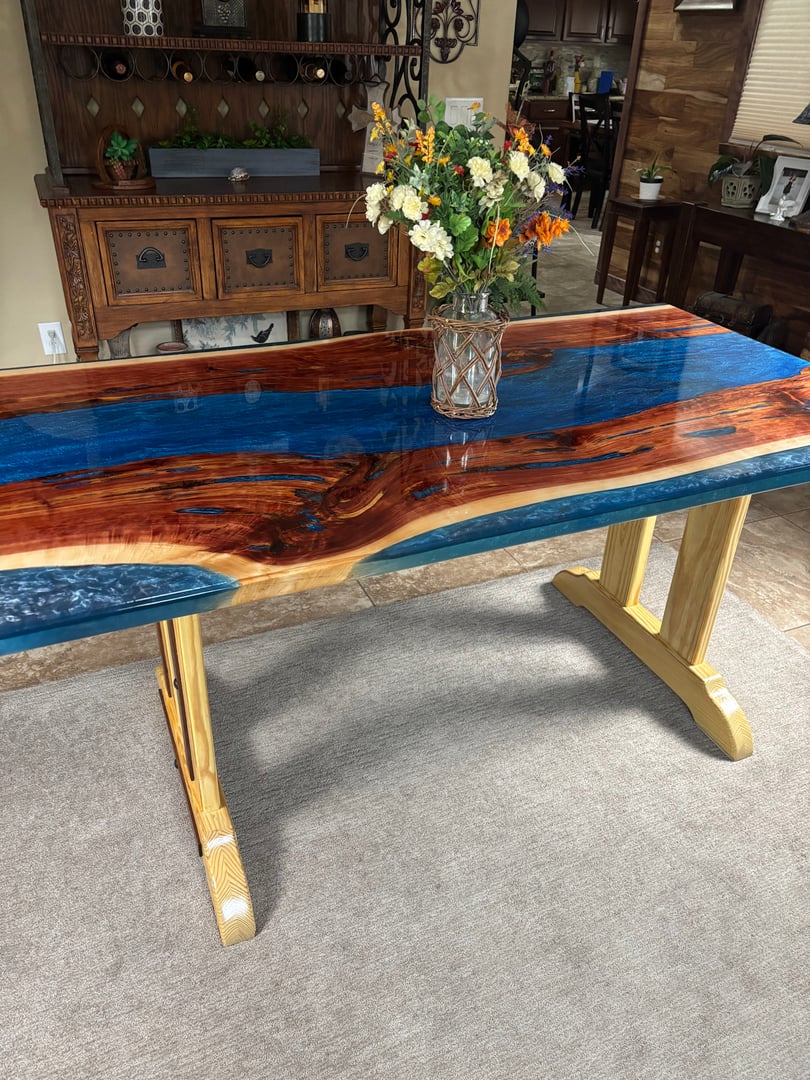 Hand Crafted Live Edge River Table with cedar wood and blue epoxy river
