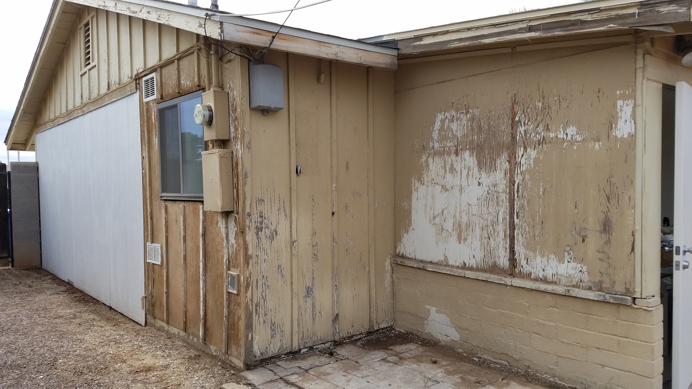 Exterior of a Fixer Upper House, Run Down Property Remodel, Peeling Paint. High quality photo