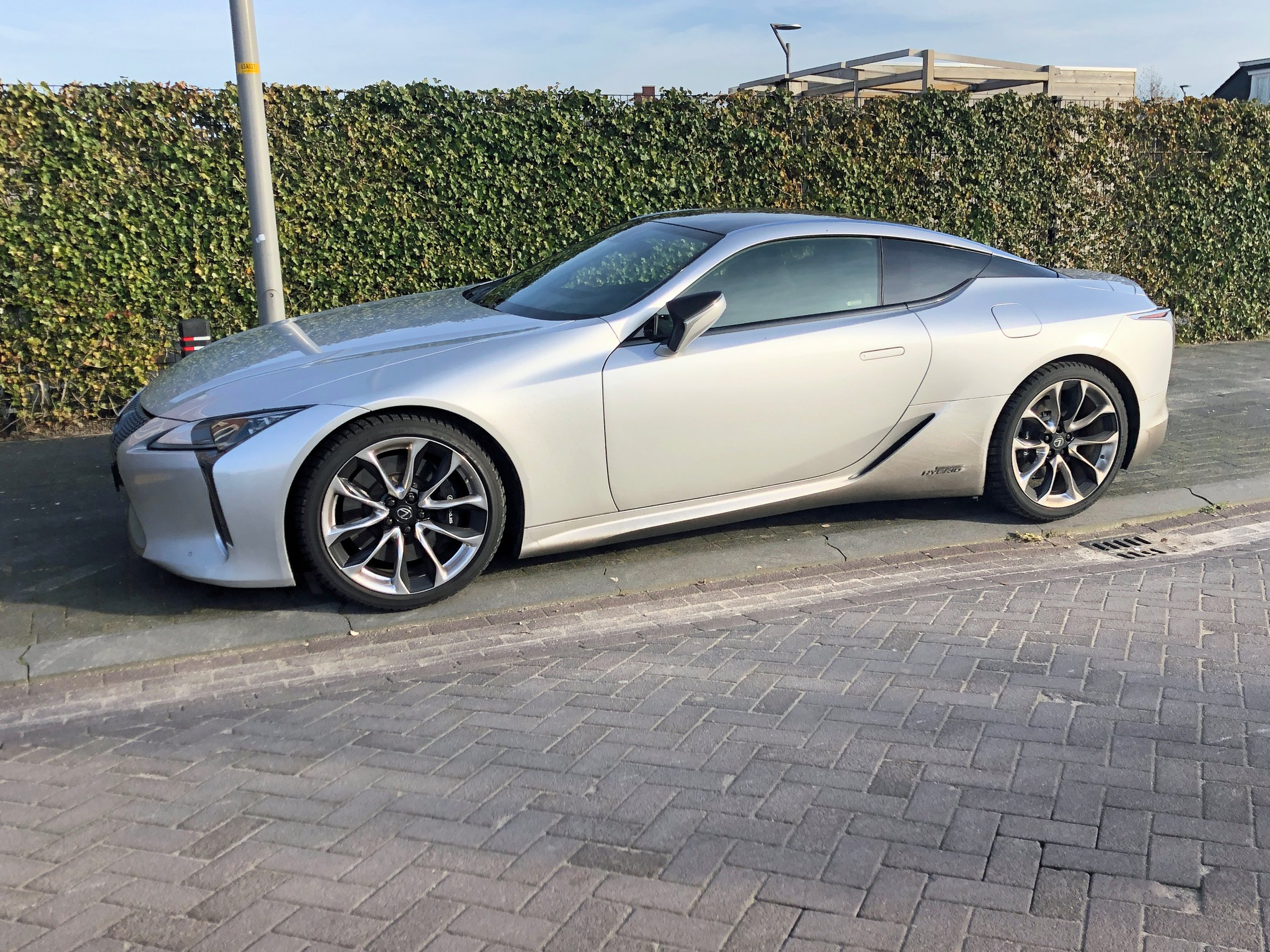 Almere, the Netherlands - November 24, 2019: Gray Lexus LC500 Hybrid parked by the side of the road. Nobody in the vehicle.