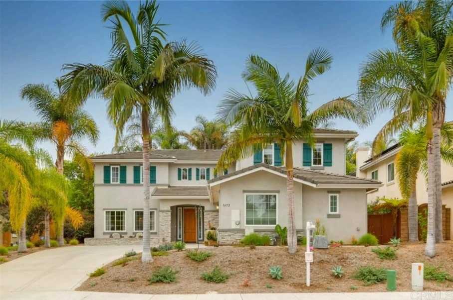 Closeup hand holding digital house contract icon with handshake, concept of online property transaction, smart real estate, and digital housing agreement.