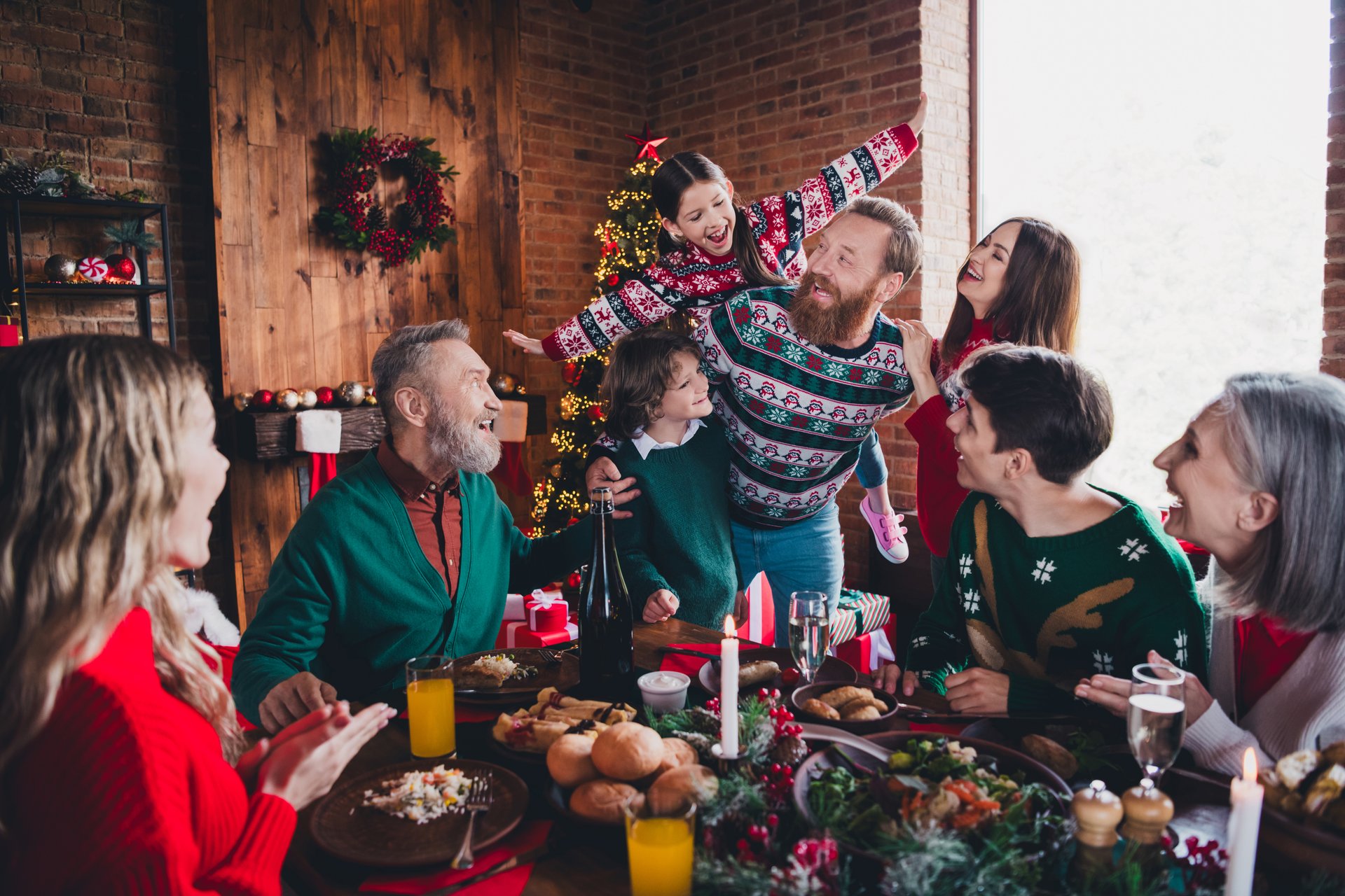Photo of big full friendly family enjoy festive dinner table gathering celebrate christmas x-mas apartment indoors.