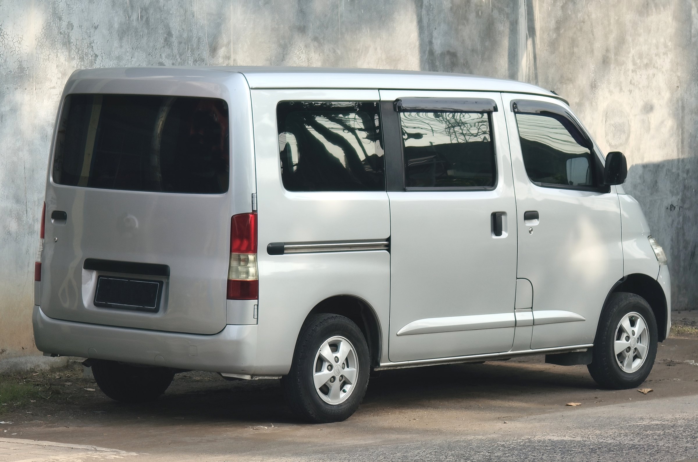 silver minivan car. shipping business transportation.