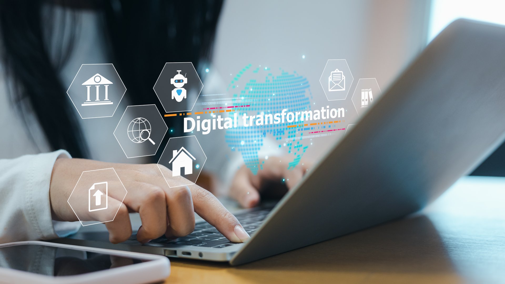 Woman using laptop with digital transformation interface, modern technology icons, innovation, data process, online system development, and future business technology concept.