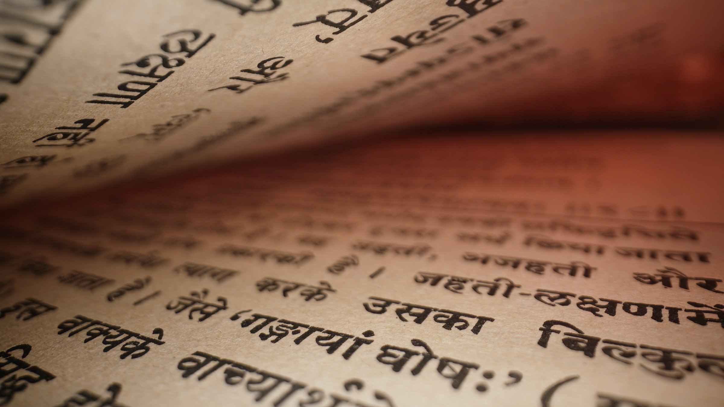 Old Vintage Handwritten Scriptures On Sanskrit. Exploring sacred vedic knowledge heritage. Revered texts in macro. Holy pages, old religious book. High quality