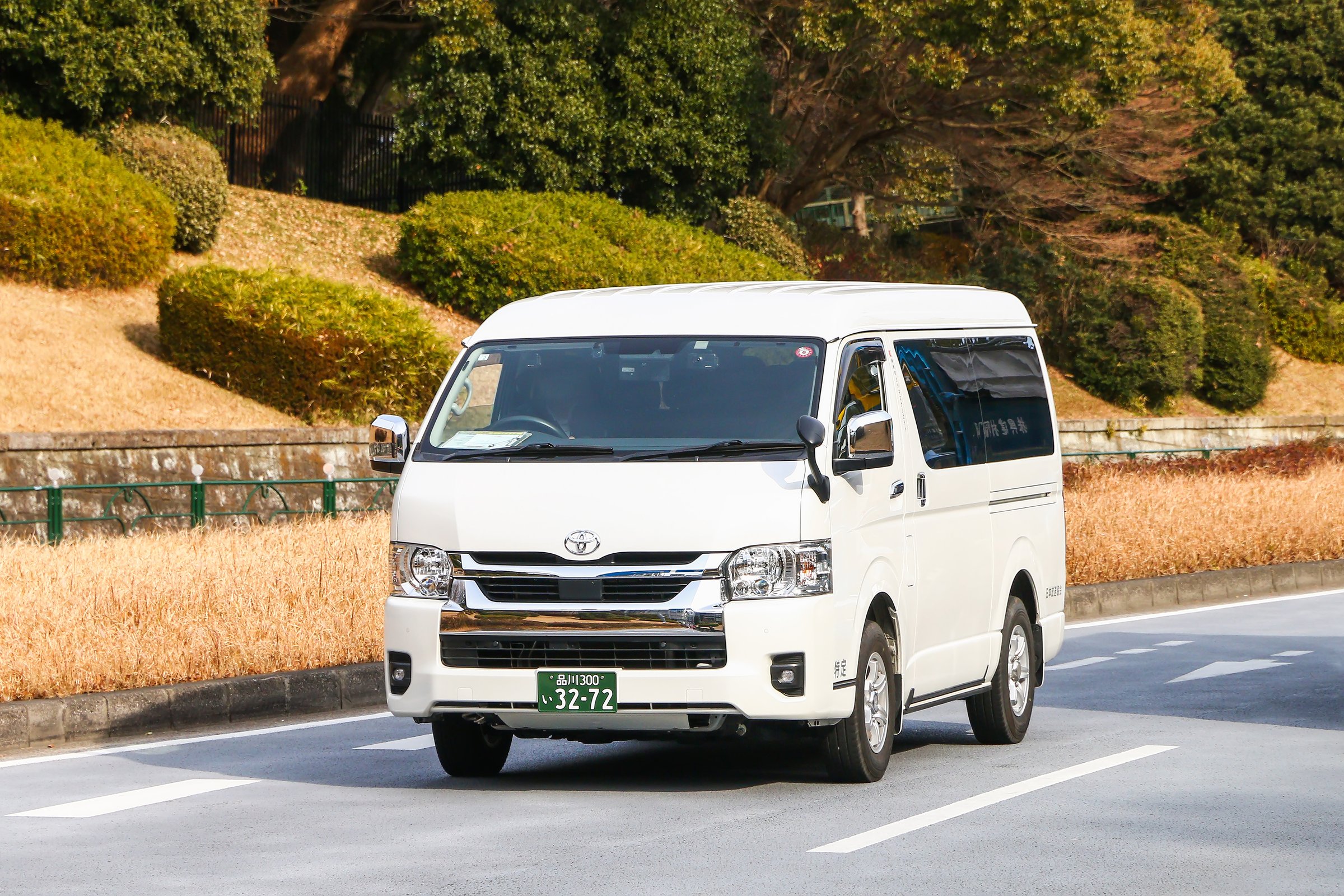 Tokyo, Japan - January 15, 2025: White panel van Toyota HiAce (H200) in the city street.