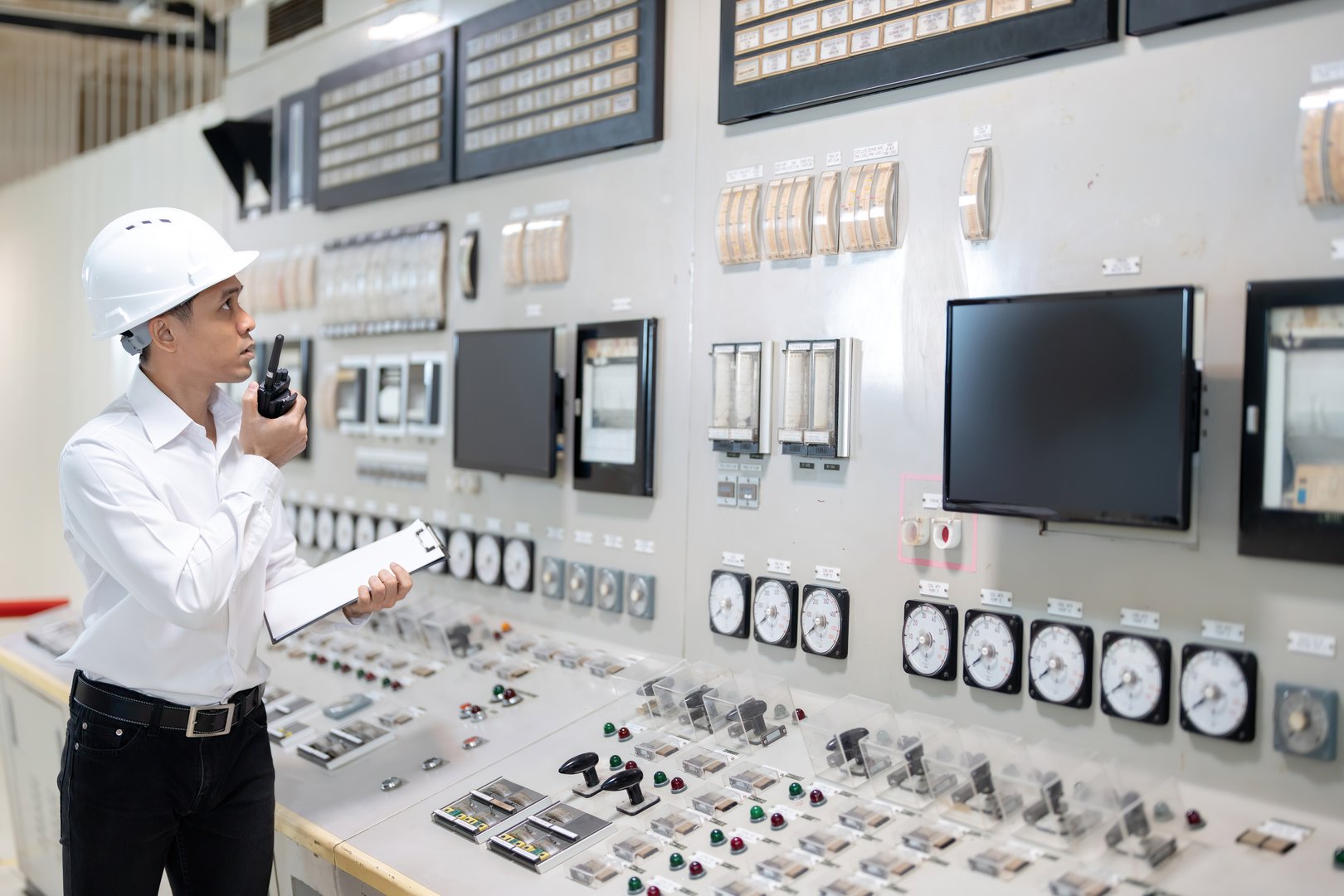 Operations engineers working on power plant