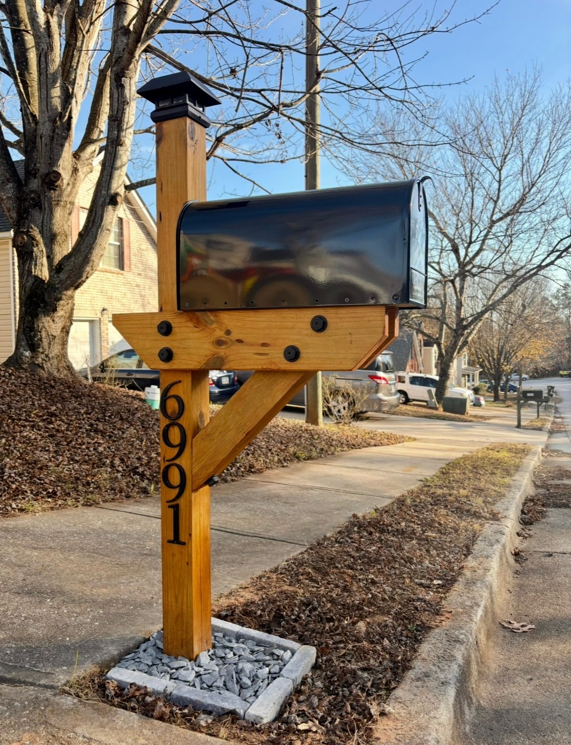 Handcrafted mailbox installation with attention to detail