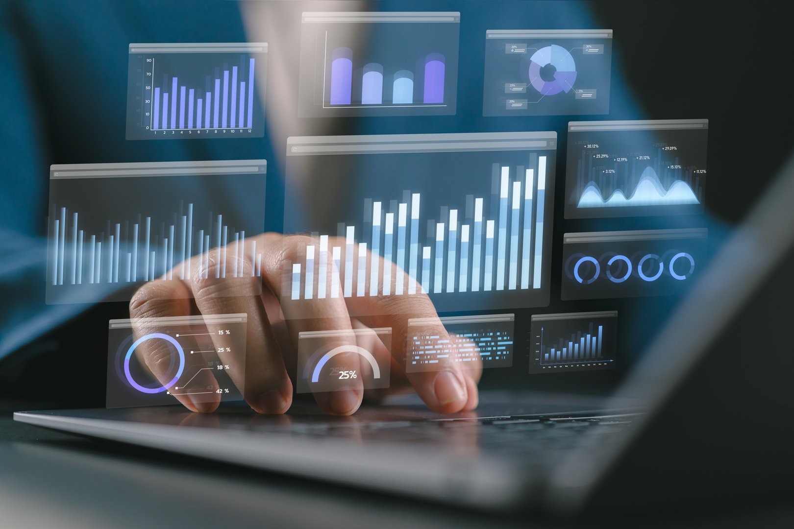 Data analytics and graphs. Analysis of statistical business marketing data. Data scientist using laptop computer to analyze data.