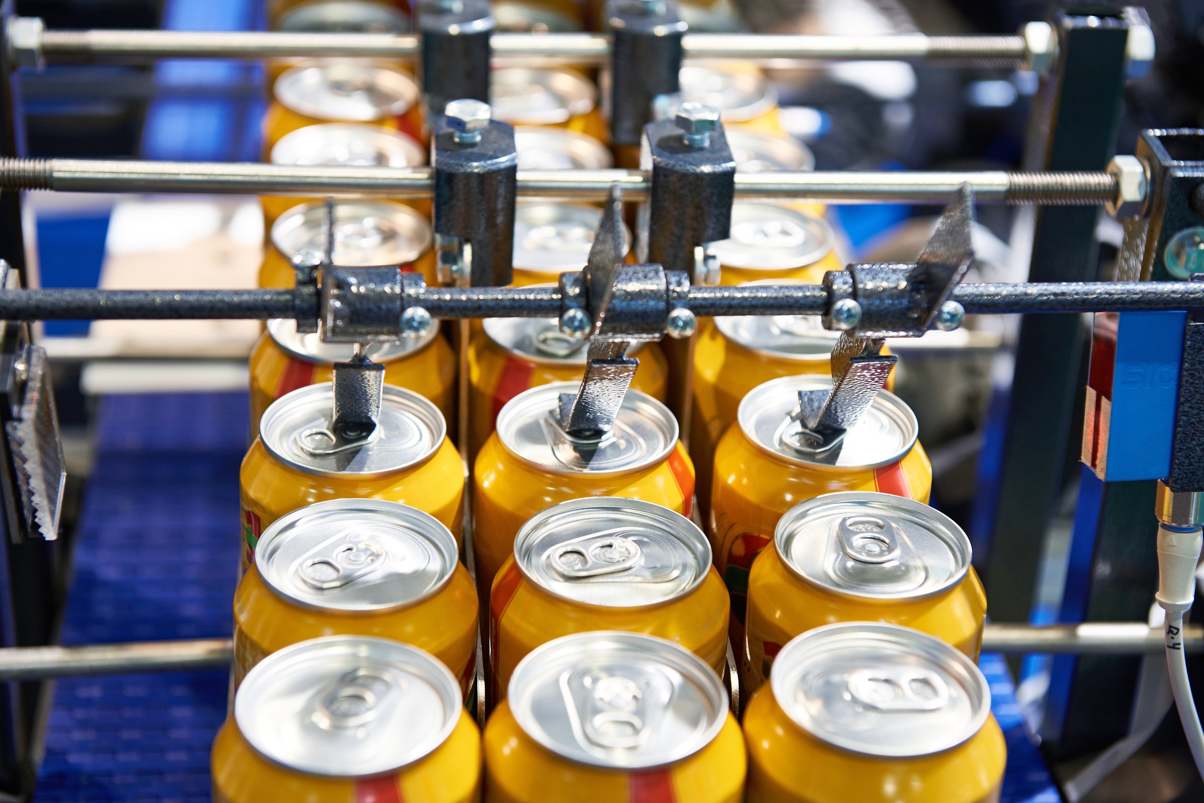 Beer can conveyor at the factory
