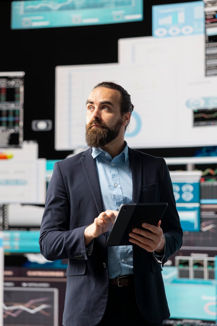 Corporate professional reviewing financial charts and KPI dashboards, ensuring business innovation and strategic insight through fintech materials and forecasting tools for corporate success.