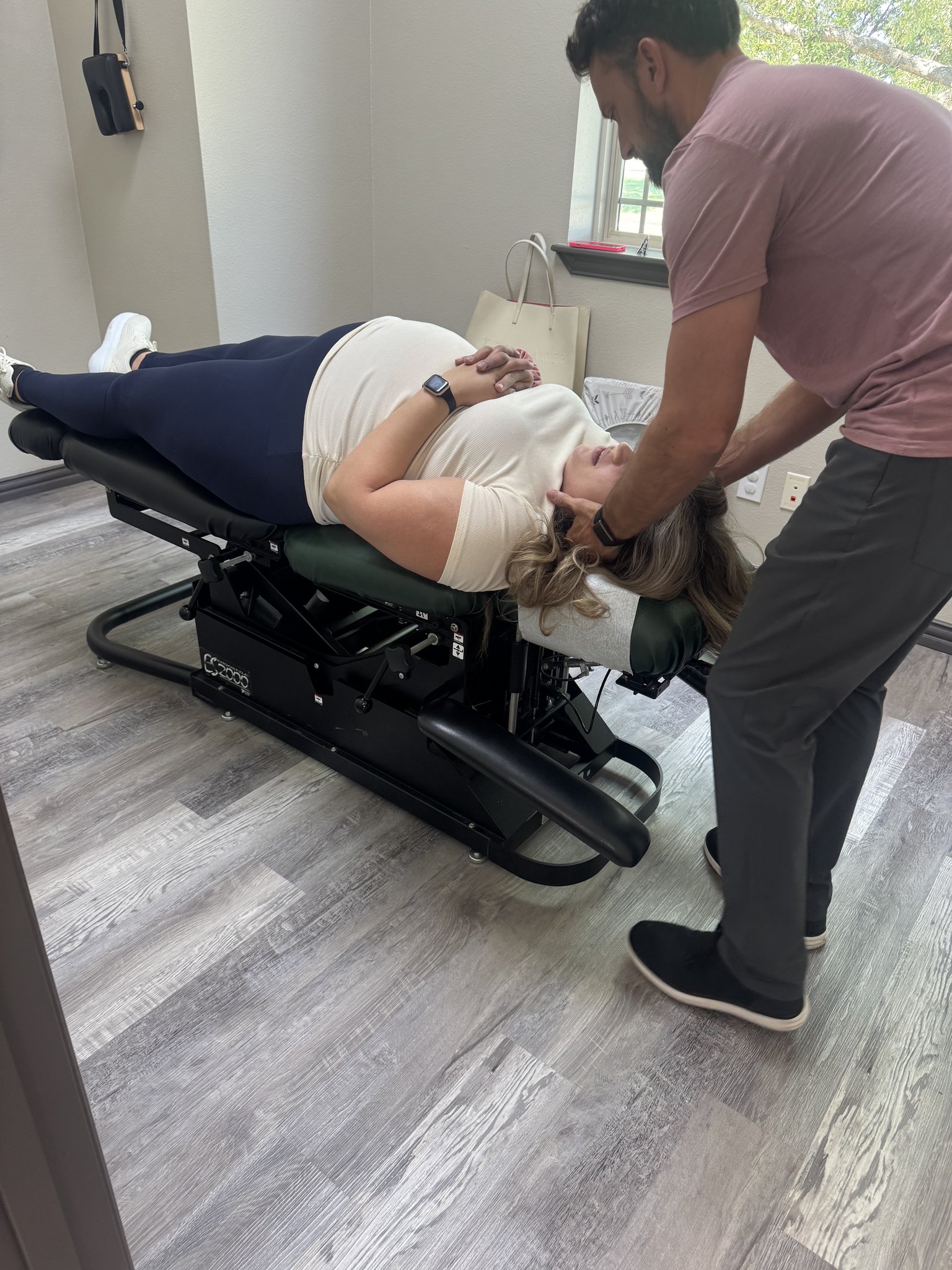 Pregnancy chiropractic care - belly up adjustment