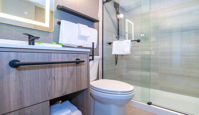 Modern hotel room interior with comfortable seating area