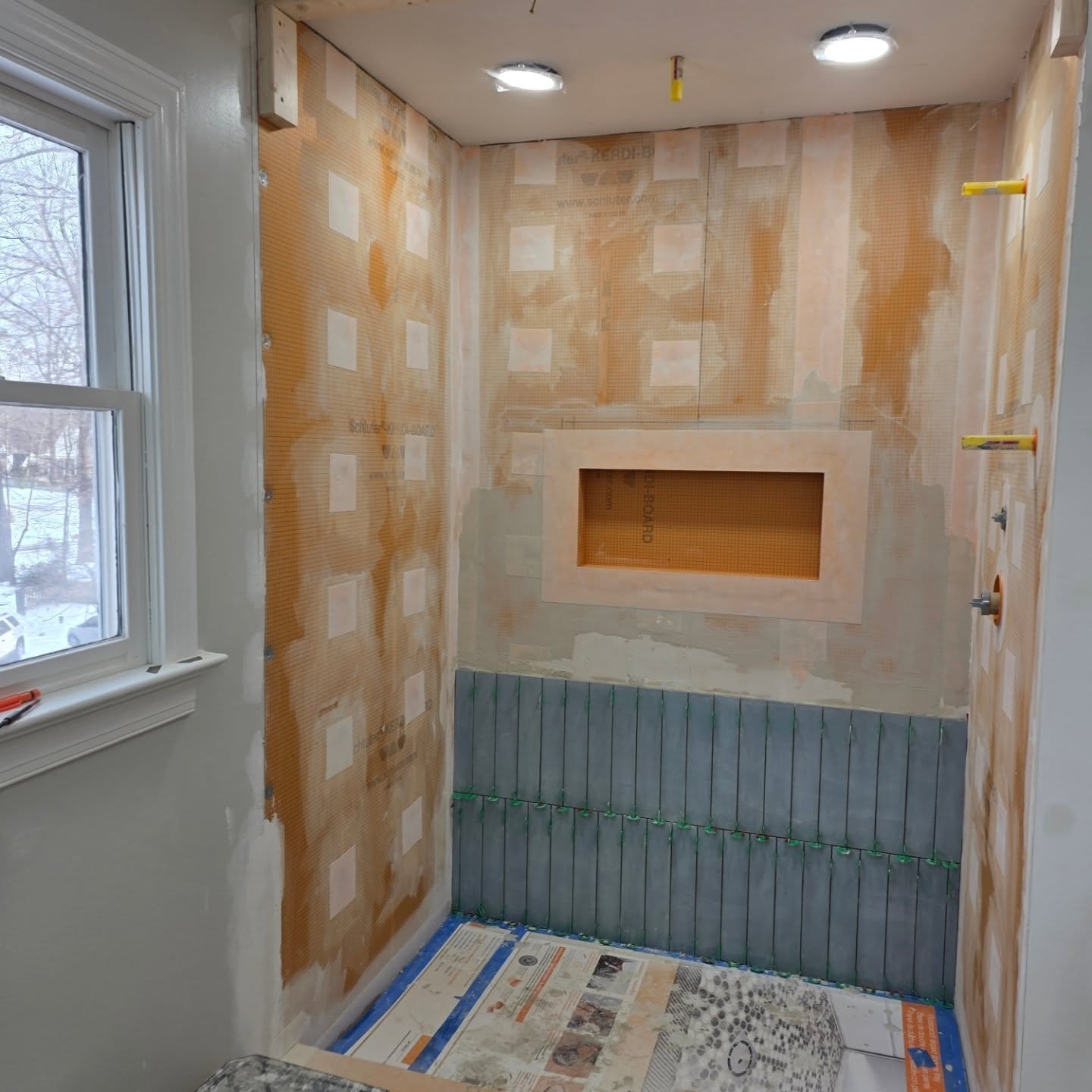 Modern brass bathroom fixtures Toledo remodel